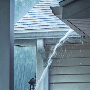 Water Overflowing From Roof Gutter